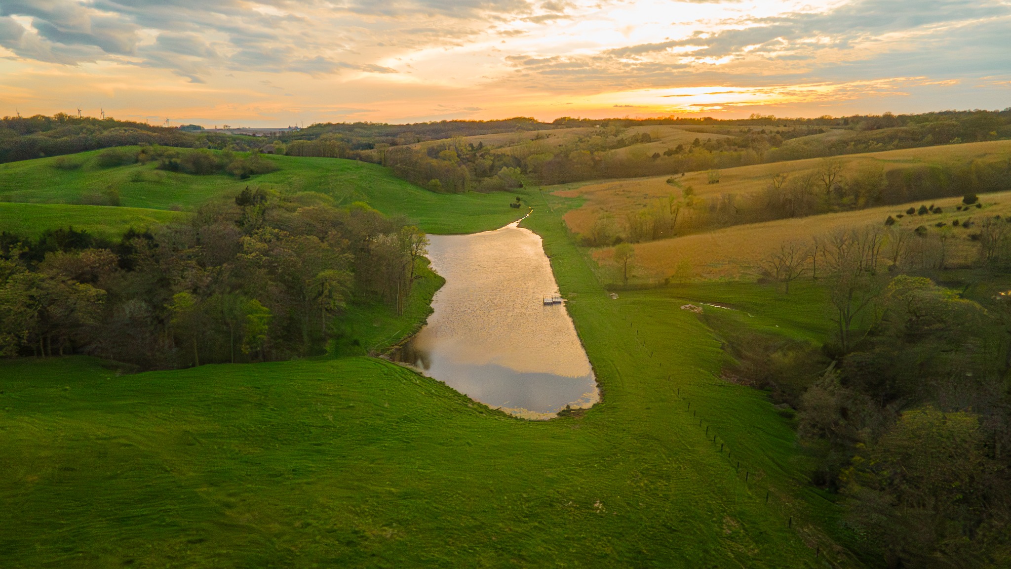 Cinematic sunset over Stagecoach Ranch pond