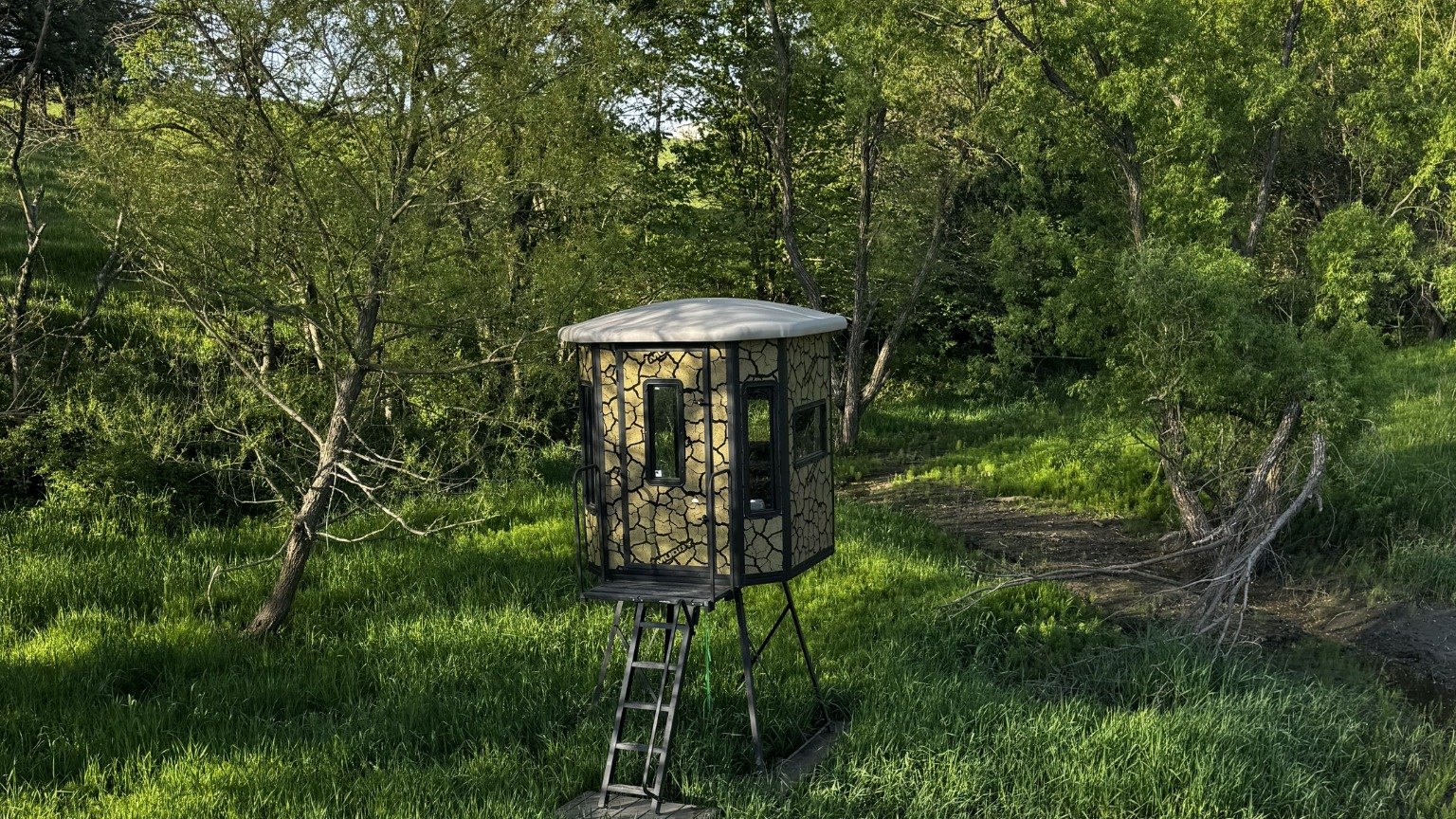 Creek, hunting blind, and timber habitat